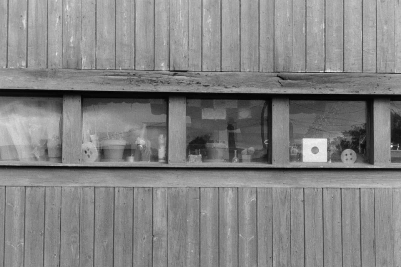 A view of items in windowsills taken from outside