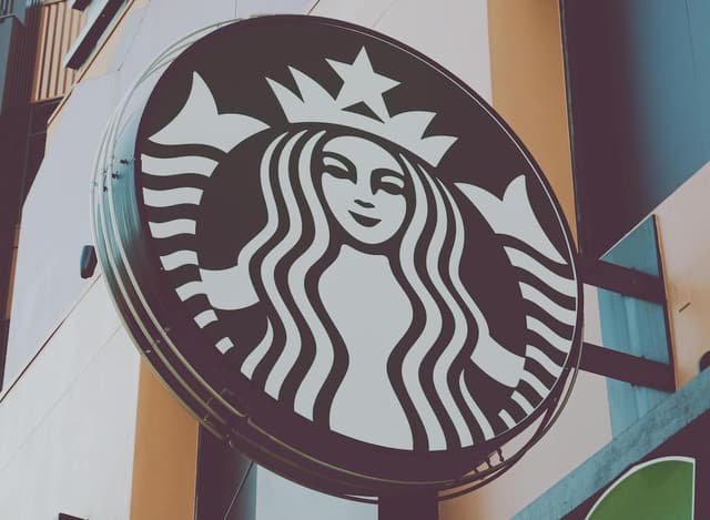 Lawsuit Accuses Starbucks of Misleading Buyers on Sustainability and Chemical Content - Featured Image