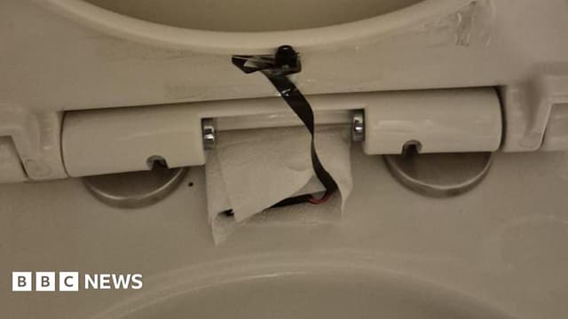 Woman felt 'violated' by webcam in Giggling Squid restaurant toilets - BBC News - Featured Image