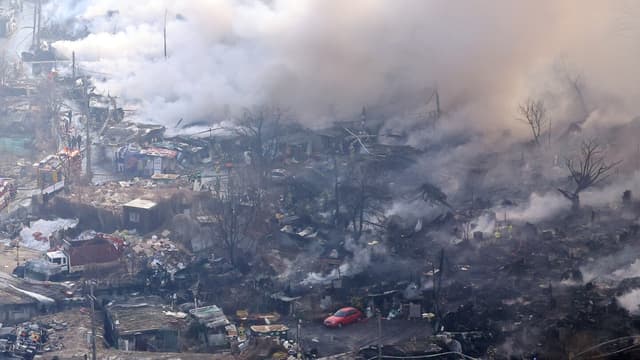 Fire forces dozens to flee shanty town in Guryong village in Seoul | AP News - Featured Image