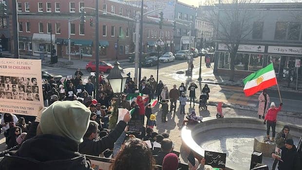 Iranians in N.B. show support for loved ones they can't reach amid protests | CBC News - Featured Image