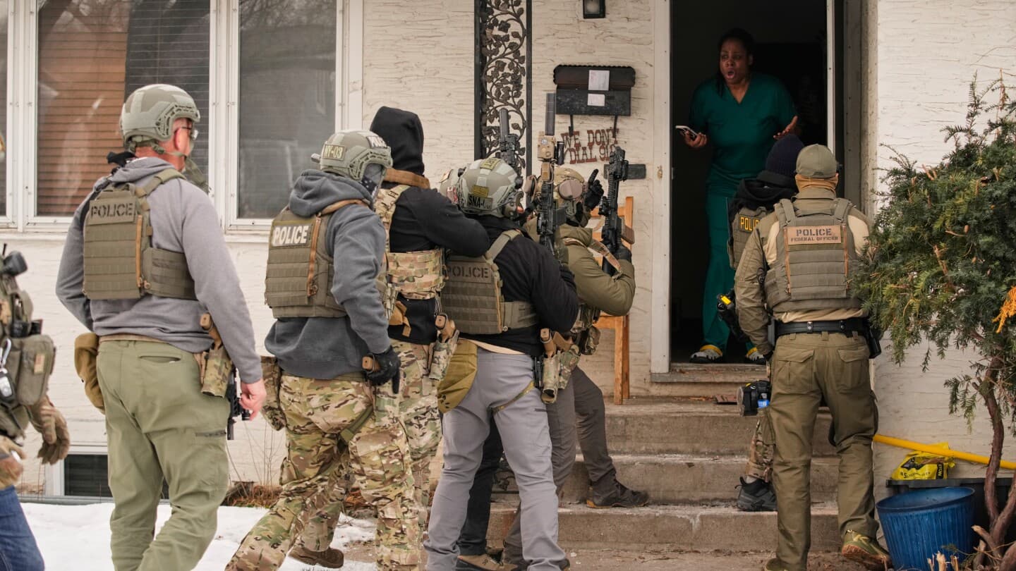 ICE officers are being told they can enter homes to make arrests without a judge's warrant | AP News - Featured Image