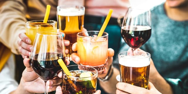 Doctors reveal why alcohol causes 'booze butt' and how to prevent it on New Year's - Featured Image