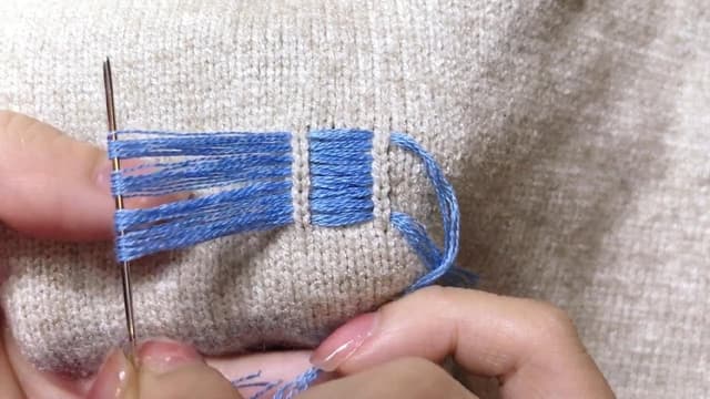 The Amazing Way to Fix a Hole in a Sweater - Featured Image
