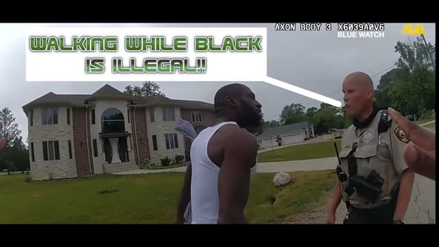 Police officers literally arrested a man for walking while black. MUST SEE!! - Featured Image