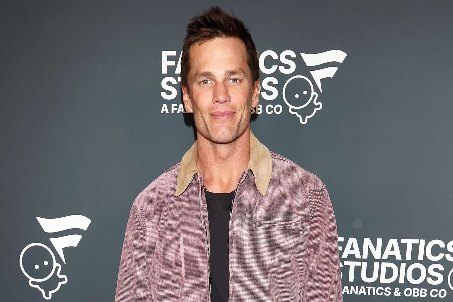 Tom Brady Says He Doesn't ‘Have Much Time for a Personal Life’ After His NYE with Alix Earle (Exclusive) - Featured Image