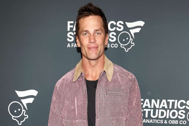 Tom Brady Says He Doesn't ‘Have Much Time for a Personal Life’ After His NYE with Alix Earle (Exclusive) - Featured Image
