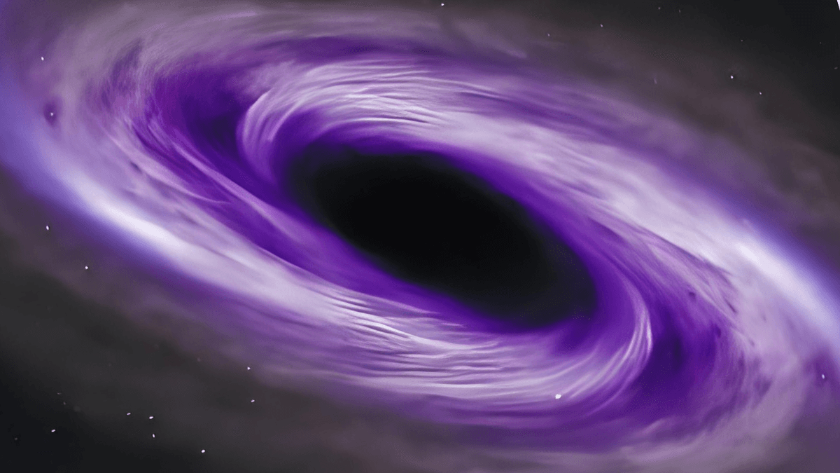 Astronomers baffled by 'mysterious disruptor' with a mass of 1 million suns and a black hole for a heart - Featured Image