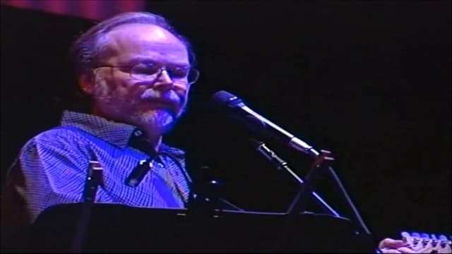 Walter Becker slang of ages - Steely Dan live 2003 - Featured Image