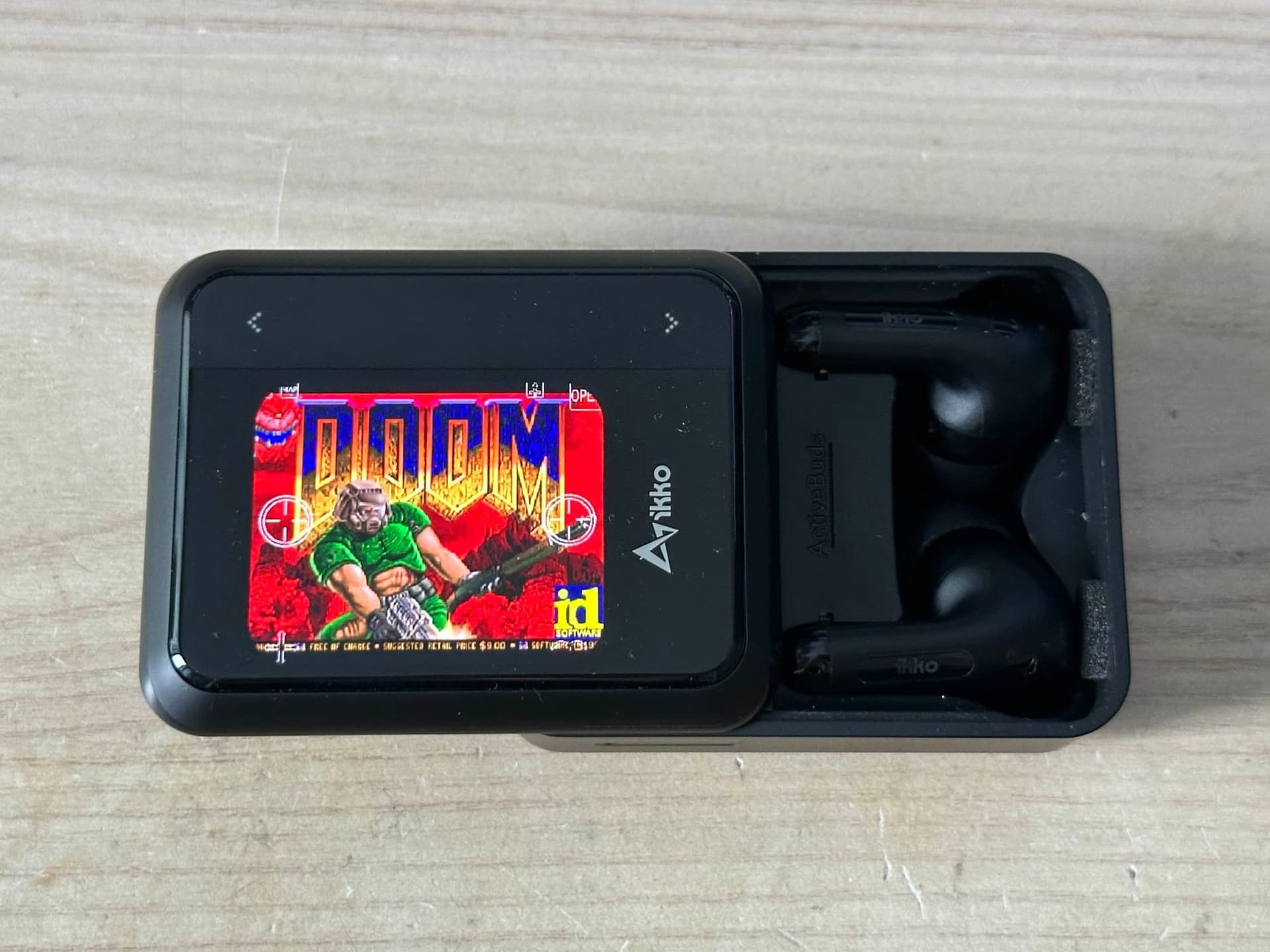 Exploiting the IKKO Activebuds "AI powered" earbuds, running DOOM, stealing their OpenAI API key and customer data. - Featured Image