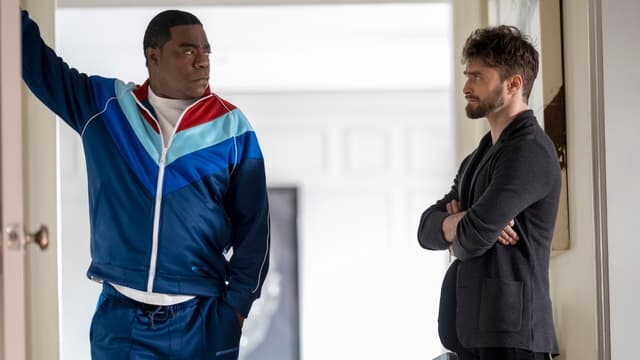 ‘The Fall and Rise of Reggie Dinkins’ Review: Tracy Morgan and Daniel Radcliffe Make an Appealing Odd Couple in NBC’s Sports Mockumentary - Featured Image